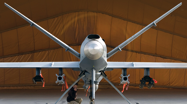 a front view of an electric drone in a hangar