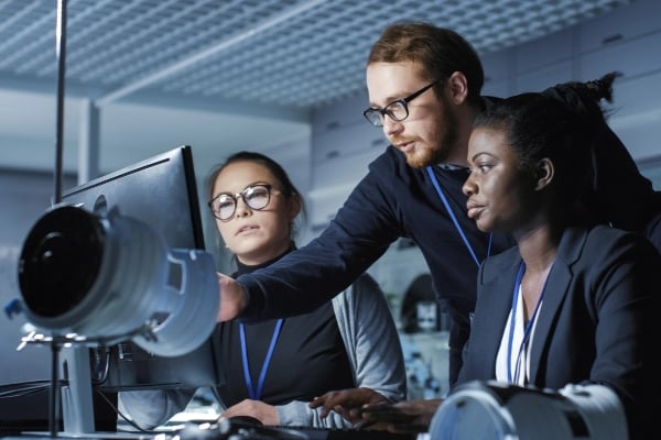 People looking at computer